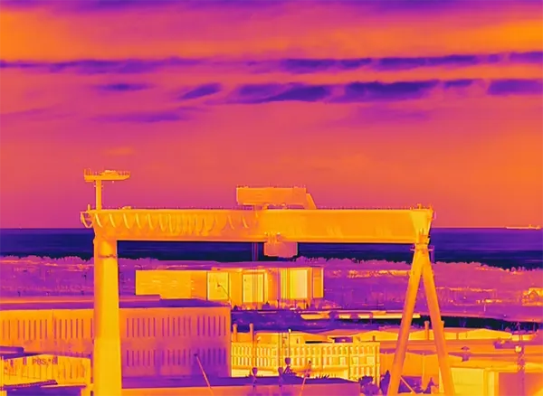 building detected by handheld thermal camera with telephoto lens